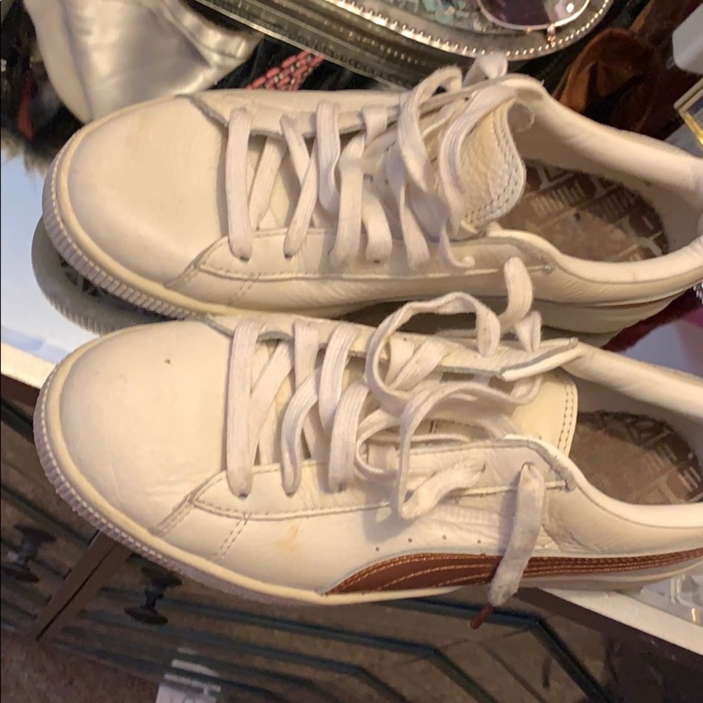 Worn Women’s Puma sneakers